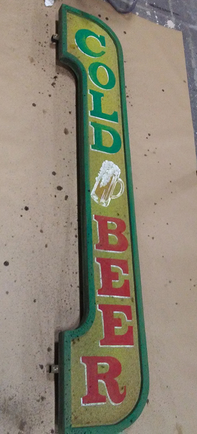 Sign reads Cold Beer